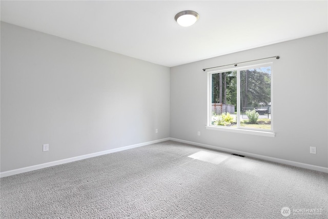 15627 240th St E, Graham, WA 98338 - carpeted empty room featuring baseboards