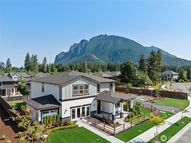property view of mountains featuring a residential view