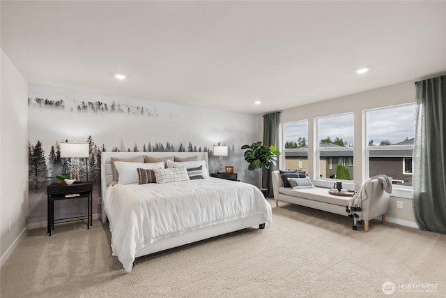 bedroom featuring light colored carpet, recessed lighting, and baseboards