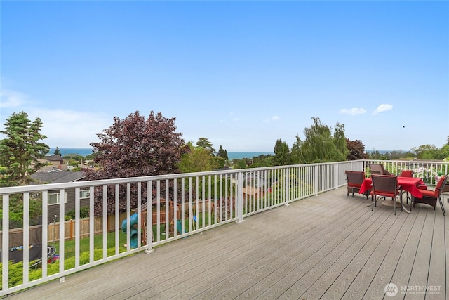 431 12th Pl N, Edmonds, WA 98020 - wooden terrace with outdoor dining space and a fenced backyard