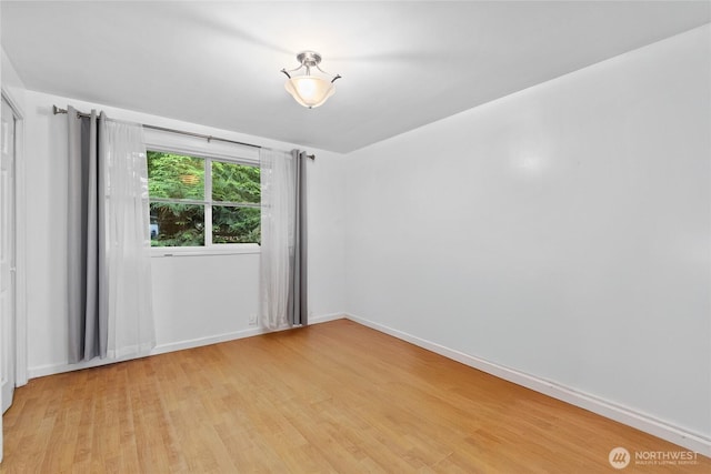 431 12th Pl N, Edmonds, WA 98020 - spare room featuring light wood-type flooring and baseboards