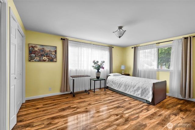 431 12th Pl N, Edmonds, WA 98020 - bedroom with wood finished floors, baseboards, and a closet