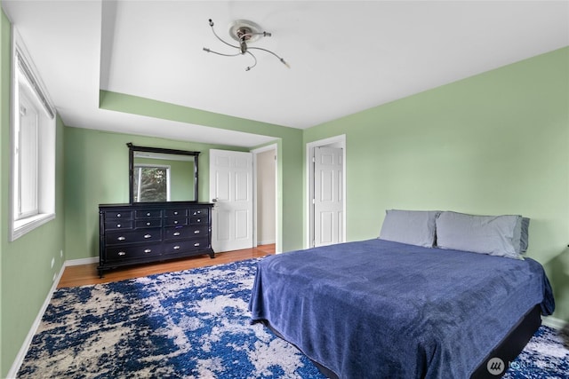 431 12th Pl N, Edmonds, WA 98020 - bedroom featuring baseboards and wood finished floors