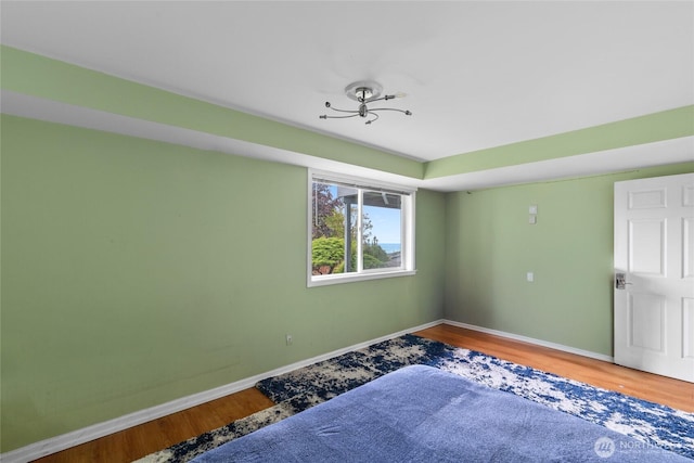 431 12th Pl N, Edmonds, WA 98020 - spare room with baseboards and wood finished floors