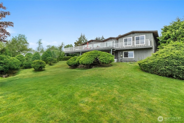 431 12th Pl N, Edmonds, WA 98020 - back of house featuring a deck and a lawn