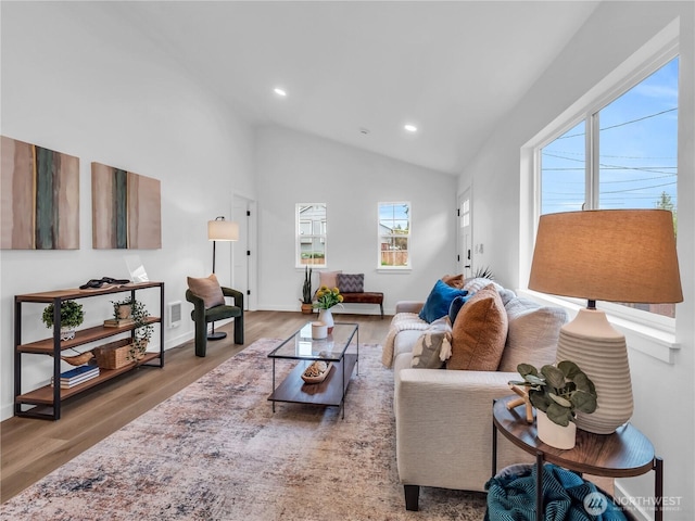 7822 Beverly Blvd Unit B, Everett, WA 98203 - living area with wood finished floors, recessed lighting, lofted ceiling, and baseboards