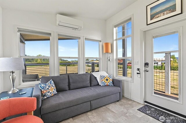 sunroom / solarium with a wall unit AC