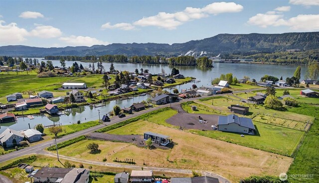 aerial view with a water and mountain view