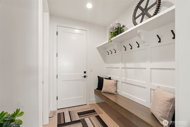 mudroom with light wood-style floors and recessed lighting
