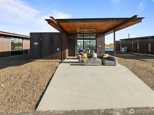 23654 Gorge View Loop NW, Quincy, WA 98848 - view of patio with an outdoor living space with a fire pit