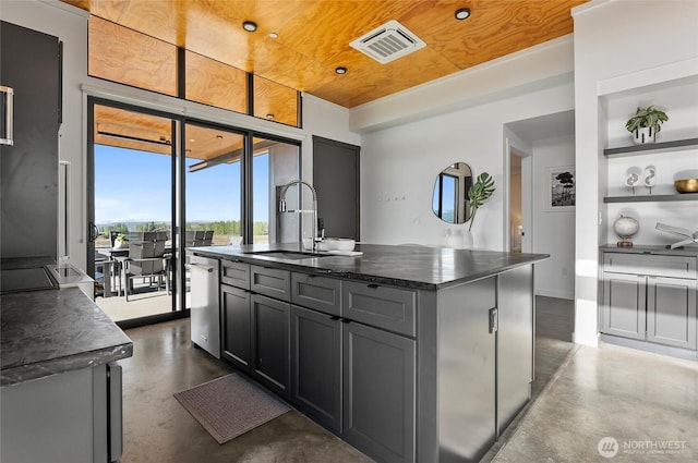 23654 Gorge View Loop NW, Quincy, WA 98848 - kitchen featuring stainless steel dishwasher, visible vents, built in features, and finished concrete flooring