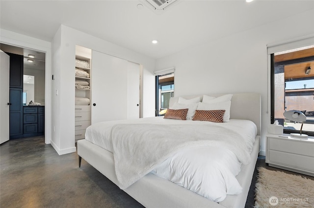 23654 Gorge View Loop NW, Quincy, WA 98848 - bedroom featuring concrete floors, recessed lighting, baseboards, visible vents, and a closet