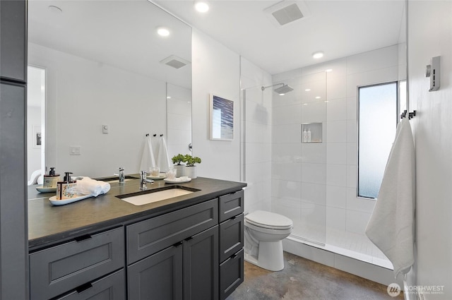 23654 Gorge View Loop NW, Quincy, WA 98848 - full bath with vanity, toilet, concrete floors, recessed lighting, and tiled shower