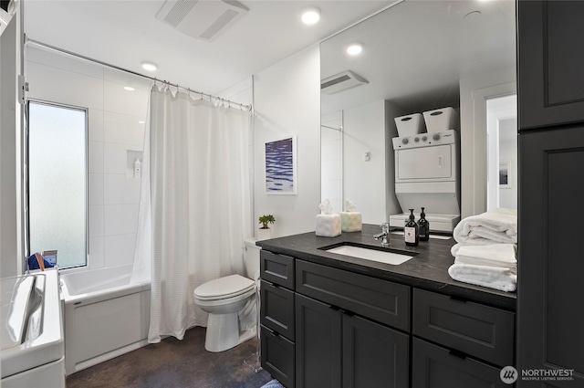 23654 Gorge View Loop NW, Quincy, WA 98848 - bathroom with visible vents, concrete flooring, stacked washer / dryer, toilet, and shower / tub combo