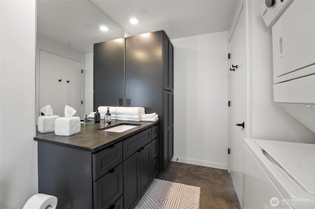 23654 Gorge View Loop NW, Quincy, WA 98848 - bathroom featuring recessed lighting, baseboards, finished concrete floors, and vanity