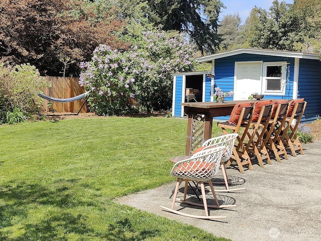 11515 7th Ave NE, Seattle, WA 98125 - view of yard with fence, an outdoor structure, and a shed