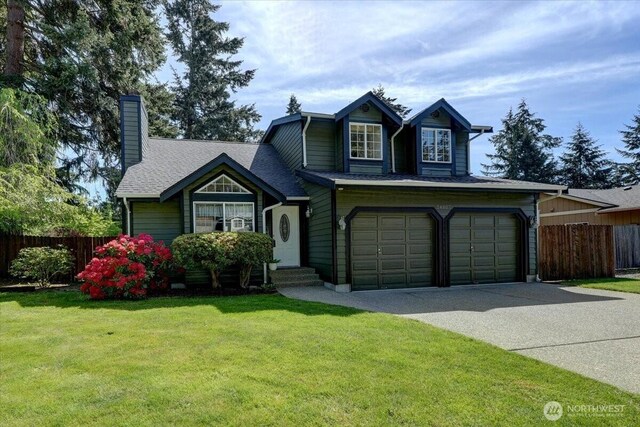 view of front of house featuring concrete driveway, a chimney, an attached garage, and roof with shingles