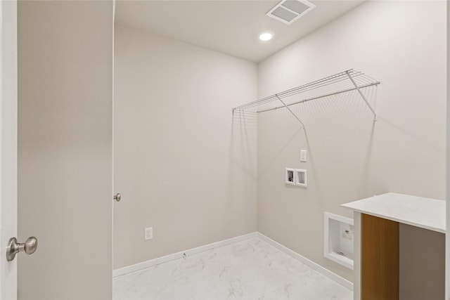 laundry area with washer hookup, laundry area, visible vents, baseboards, and marble finish floor