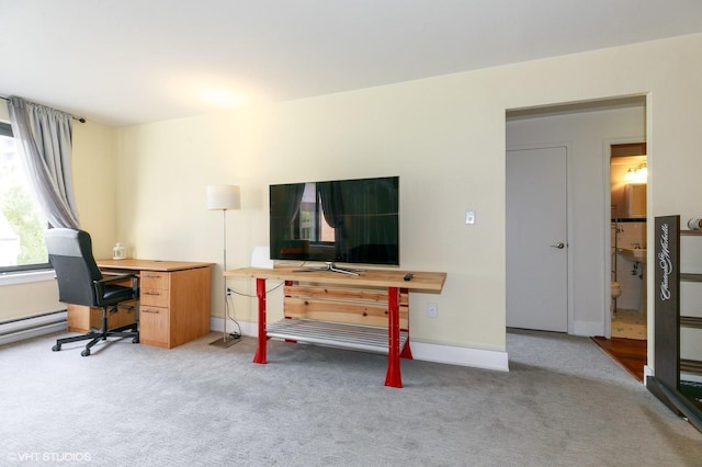 home office featuring carpet floors and baseboards