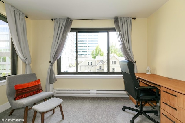 carpeted home office featuring a baseboard radiator, baseboards, and plenty of natural light
