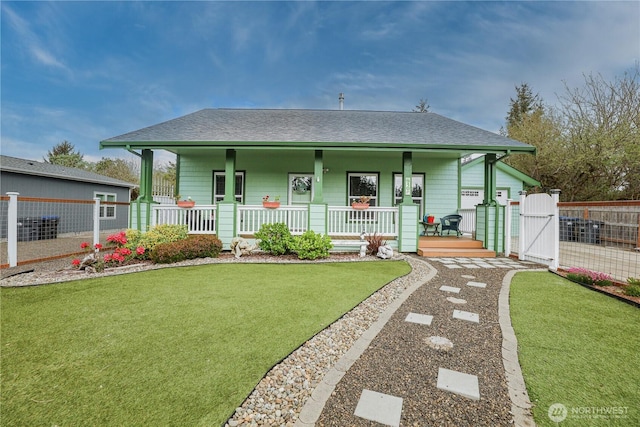 bungalow with a porch, roof with shingles, a gate, fence, and a front lawn