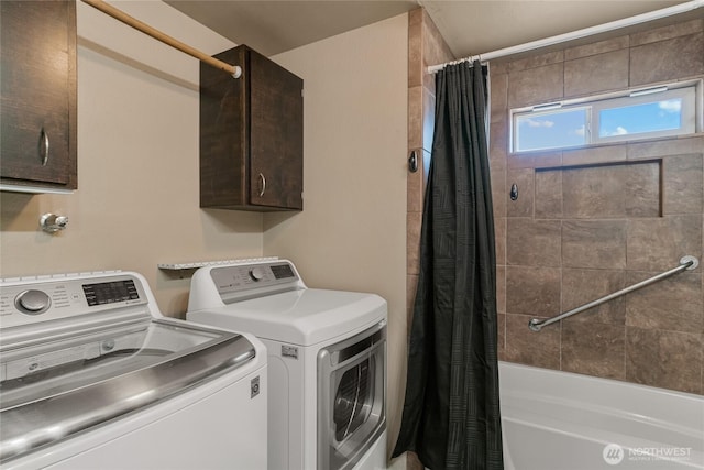 laundry room featuring laundry area and washing machine and clothes dryer