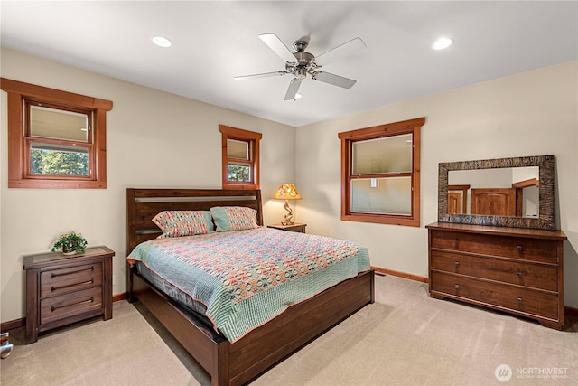 bedroom featuring light colored carpet, baseboards, recessed lighting, and a ceiling fan