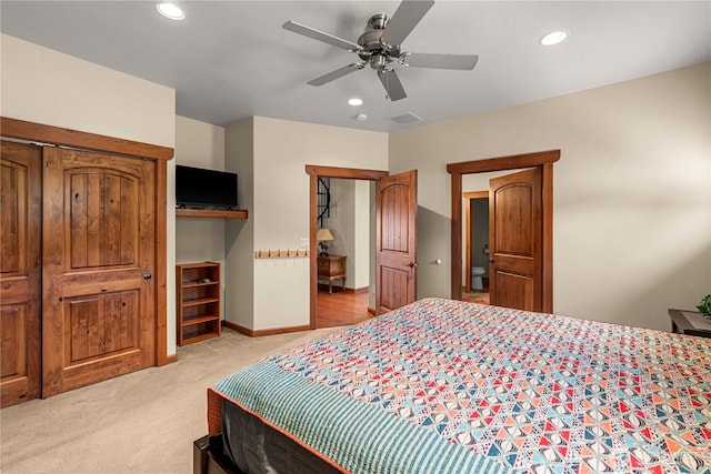 bedroom with recessed lighting, light colored carpet, a ceiling fan, and baseboards