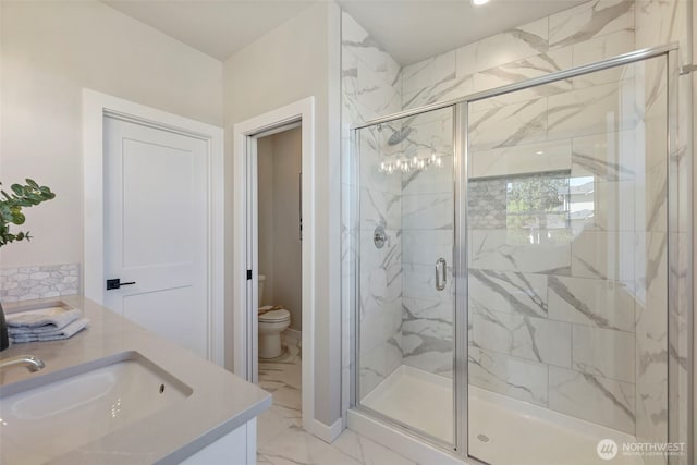 26632 NE 143rd Pl, Duvall, WA 98019 - bathroom featuring toilet, a marble finish shower, marble finish floor, and vanity