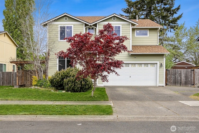 view of front of home featuring an attached garage, a shingled roof, fence, and concrete driveway