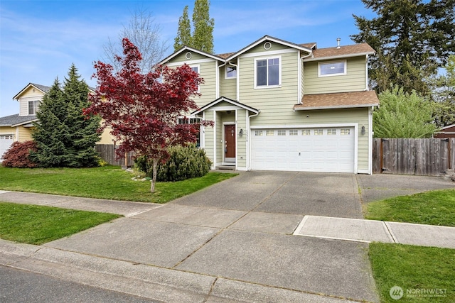 view of front of home with driveway, a front yard, a garage, fence, and a shingled roof