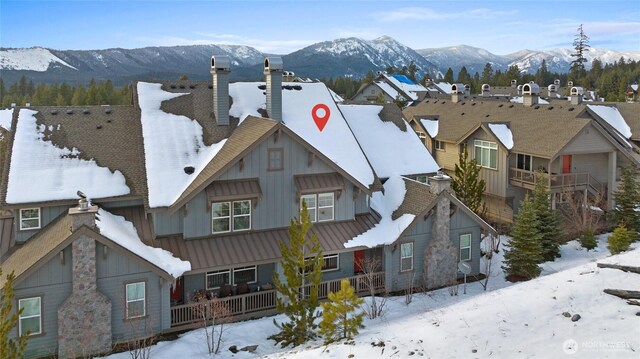 exterior space featuring a mountain view