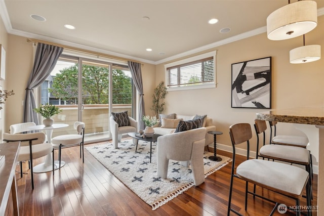 sitting room with recessed lighting, baseboards, ornamental molding, and dark wood-style flooring