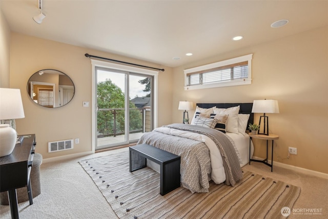 bedroom featuring access to outside, carpet, baseboards, and visible vents