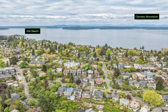 aerial view with a water view and a residential view