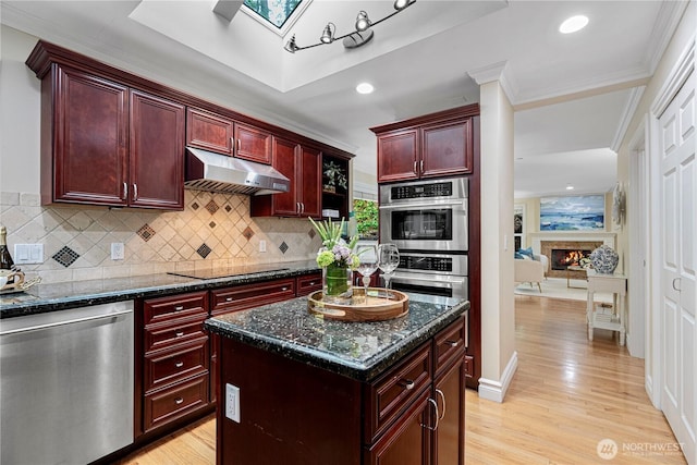 1823 Richards Rd, Bellevue, WA 98005 - kitchen featuring crown molding, dark brown cabinets, stainless steel appliances, tasteful backsplash, and under cabinet range hood