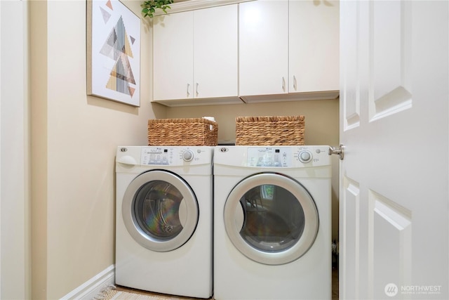 1823 Richards Rd, Bellevue, WA 98005 - washroom with baseboards, washer and clothes dryer, and cabinet space