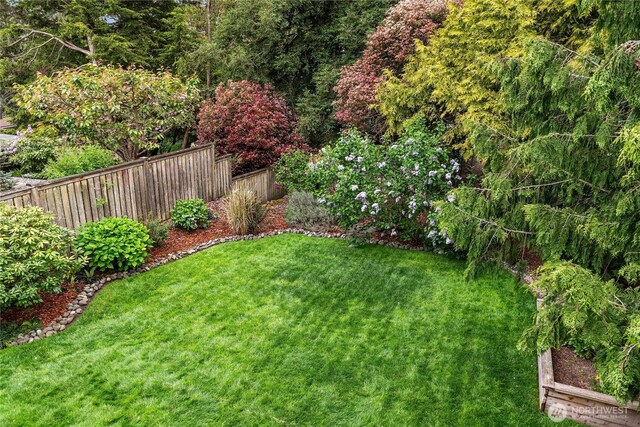 view of yard featuring fence