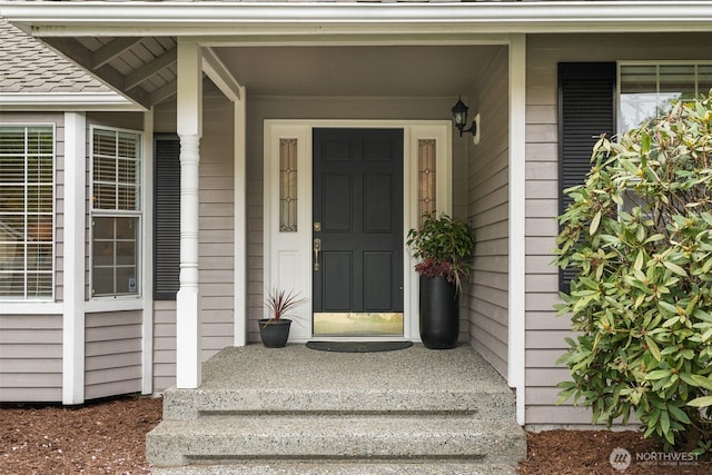 property entrance with a porch