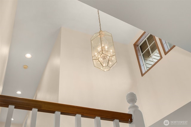 details featuring recessed lighting and an inviting chandelier