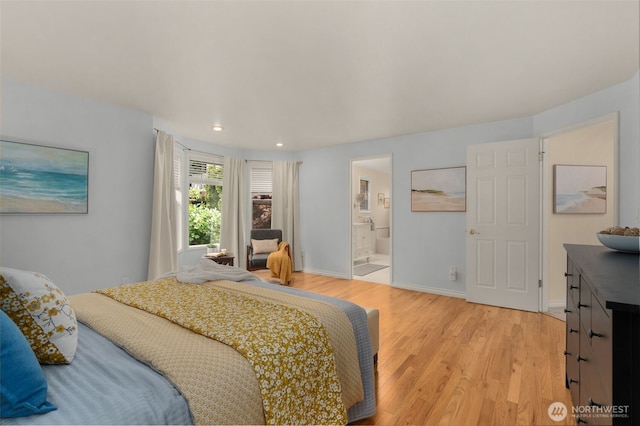 bedroom featuring light wood-type flooring, recessed lighting, baseboards, and connected bathroom