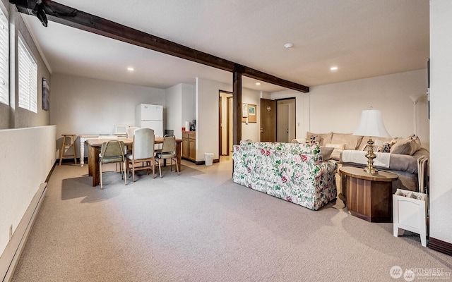 1113 5th Ave S Unit 301, Edmonds, WA 98020 - carpeted living area featuring beam ceiling, recessed lighting, a baseboard radiator, and baseboards