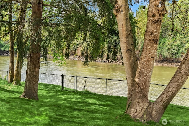 water view featuring fence