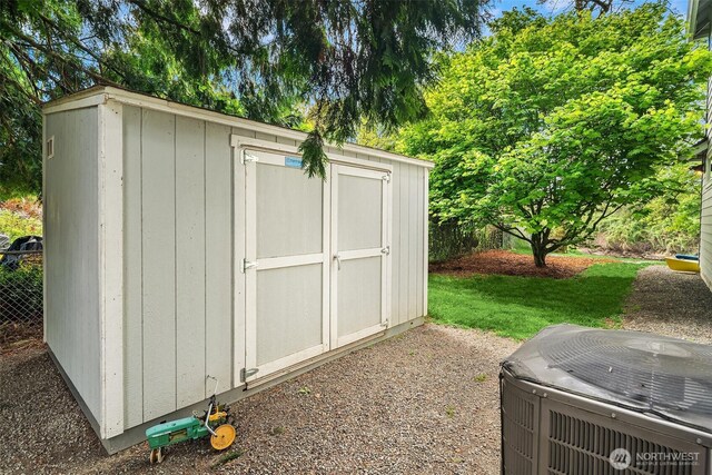 view of shed featuring central air condition unit