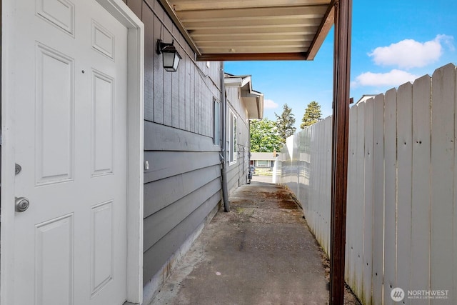 view of property exterior with fence
