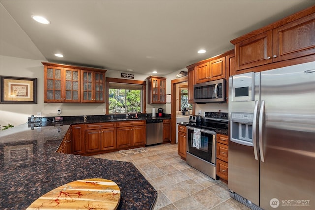 81 N Fawn Dr, Hoodsport, WA 98548 - kitchen with brown cabinets, stainless steel appliances, recessed lighting, and a sink