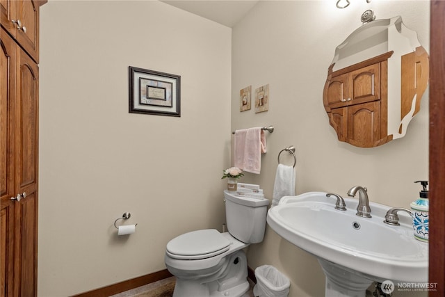81 N Fawn Dr, Hoodsport, WA 98548 - half bath featuring baseboards, a sink, and toilet
