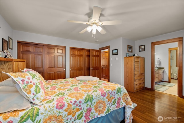 81 N Fawn Dr, Hoodsport, WA 98548 - bedroom with a ceiling fan, wood finished floors, baseboards, two closets, and connected bathroom