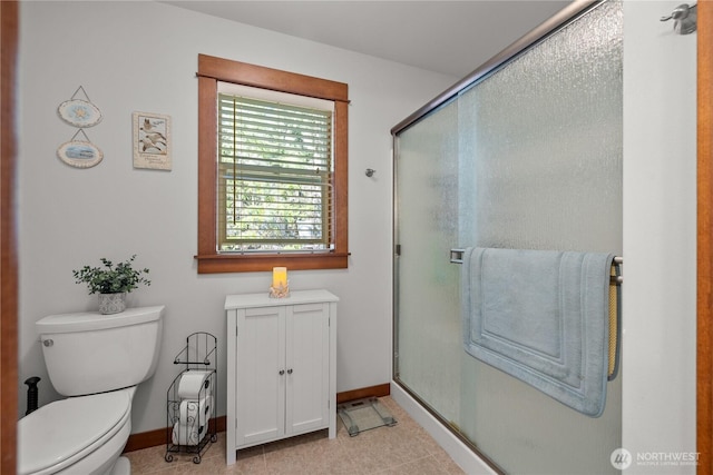 81 N Fawn Dr, Hoodsport, WA 98548 - bathroom with baseboards, a stall shower, and toilet