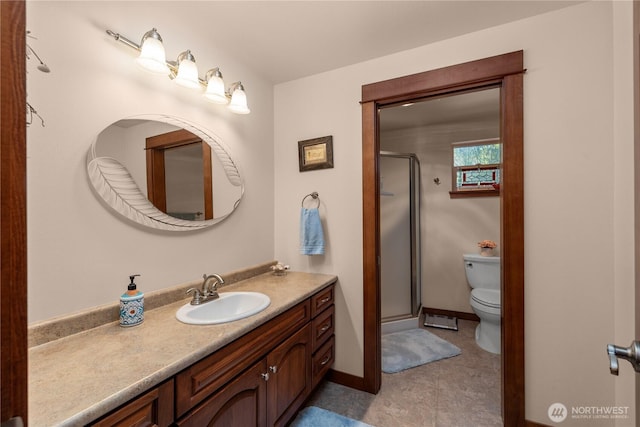 81 N Fawn Dr, Hoodsport, WA 98548 - full bath with vanity, baseboards, a stall shower, and toilet